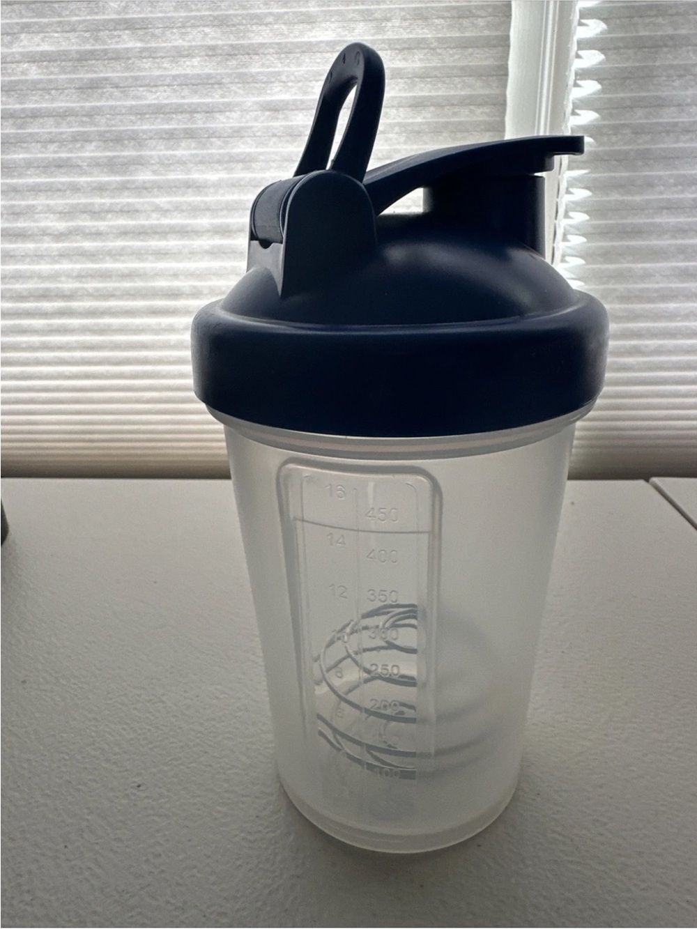 Clear Protein Shaker Bottle with Blue Lid